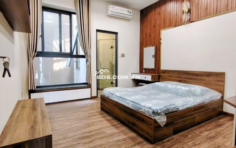 Chợ Hạnh Thông Tây - nhà hẻm xe tải - doanh thu đến 35tr - 105m2 - 5 tầng - ngang 5,5m - 9.35 tỷ